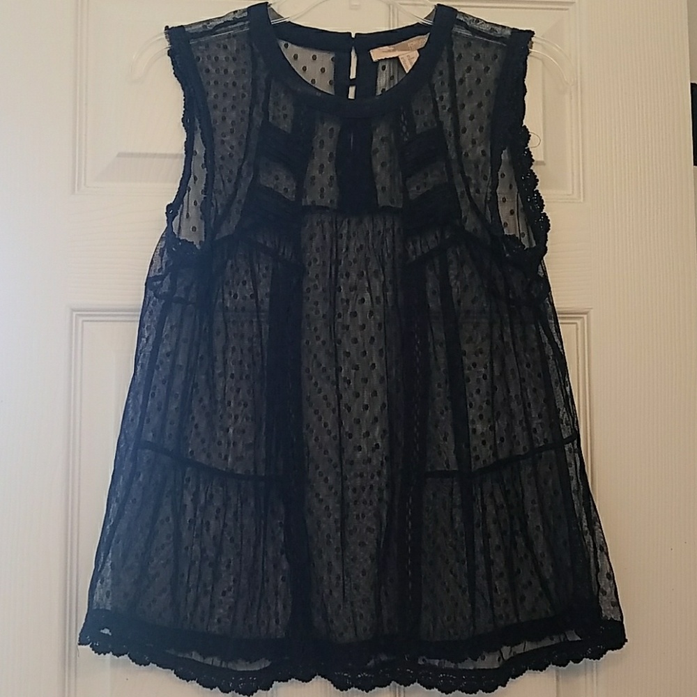 A sleeveless sheer Forever 21 top